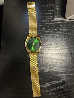 Nixon watch green face
